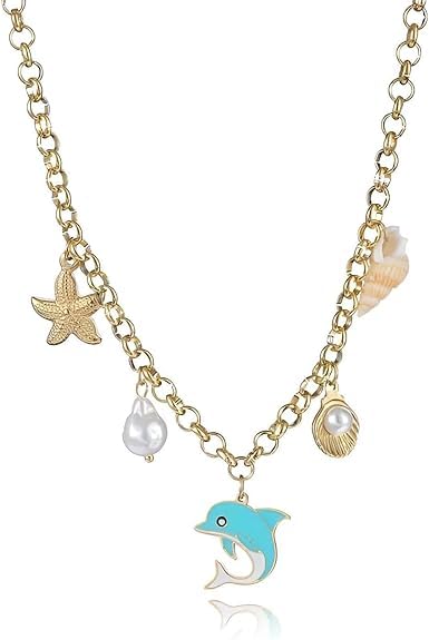 A beautiful gold-plated stainless steel starfish necklace with a seashell pendant, a must-have for summer fashion and aesthetic jewelry collections.