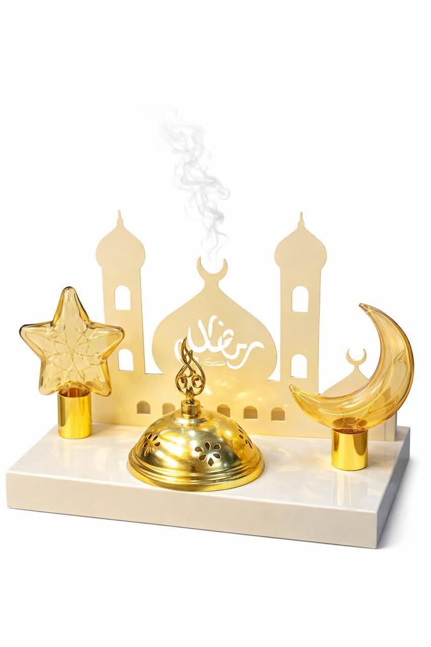 Ramadan Glow Burner - Premium full‑metal incense burner showcasing a luminous glass crescent and star that emits fragrant smoke and soft light, enriching Ramadan evenings and gatherings.