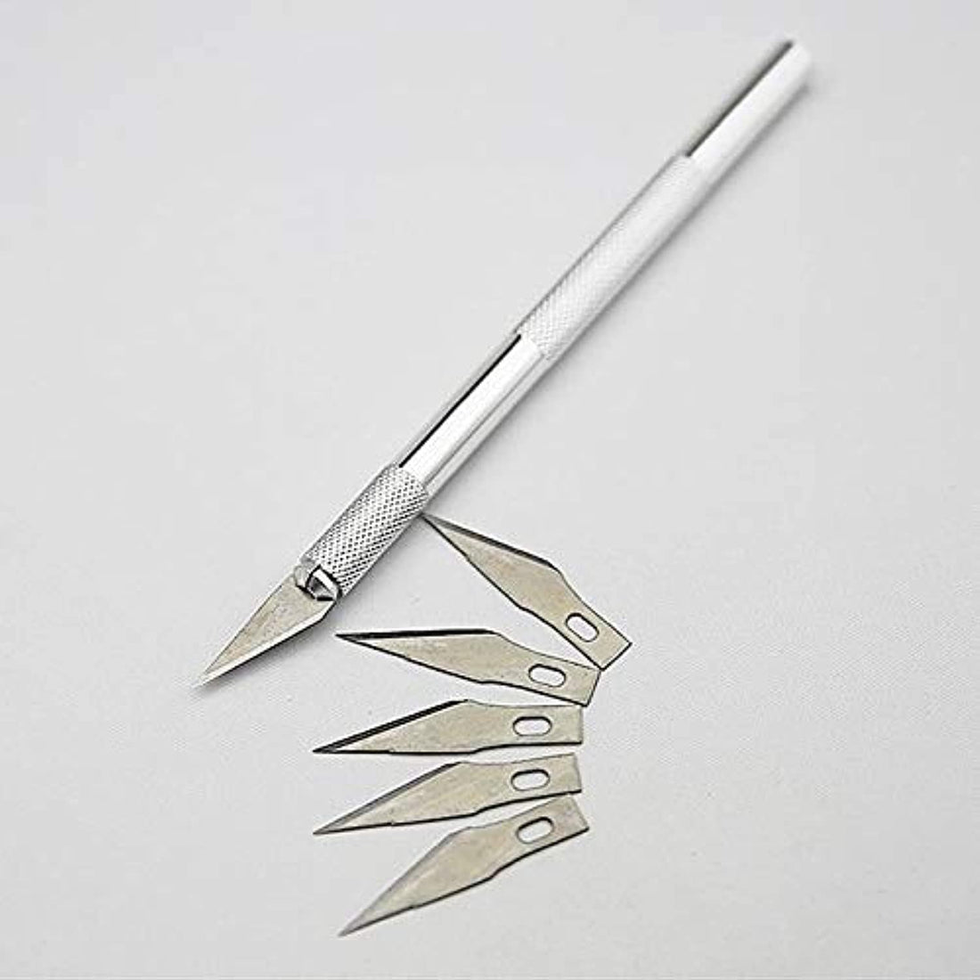 Manual Knife for Carving and Cutting - Comes with Handle and 6 Pieces of Solid Blades