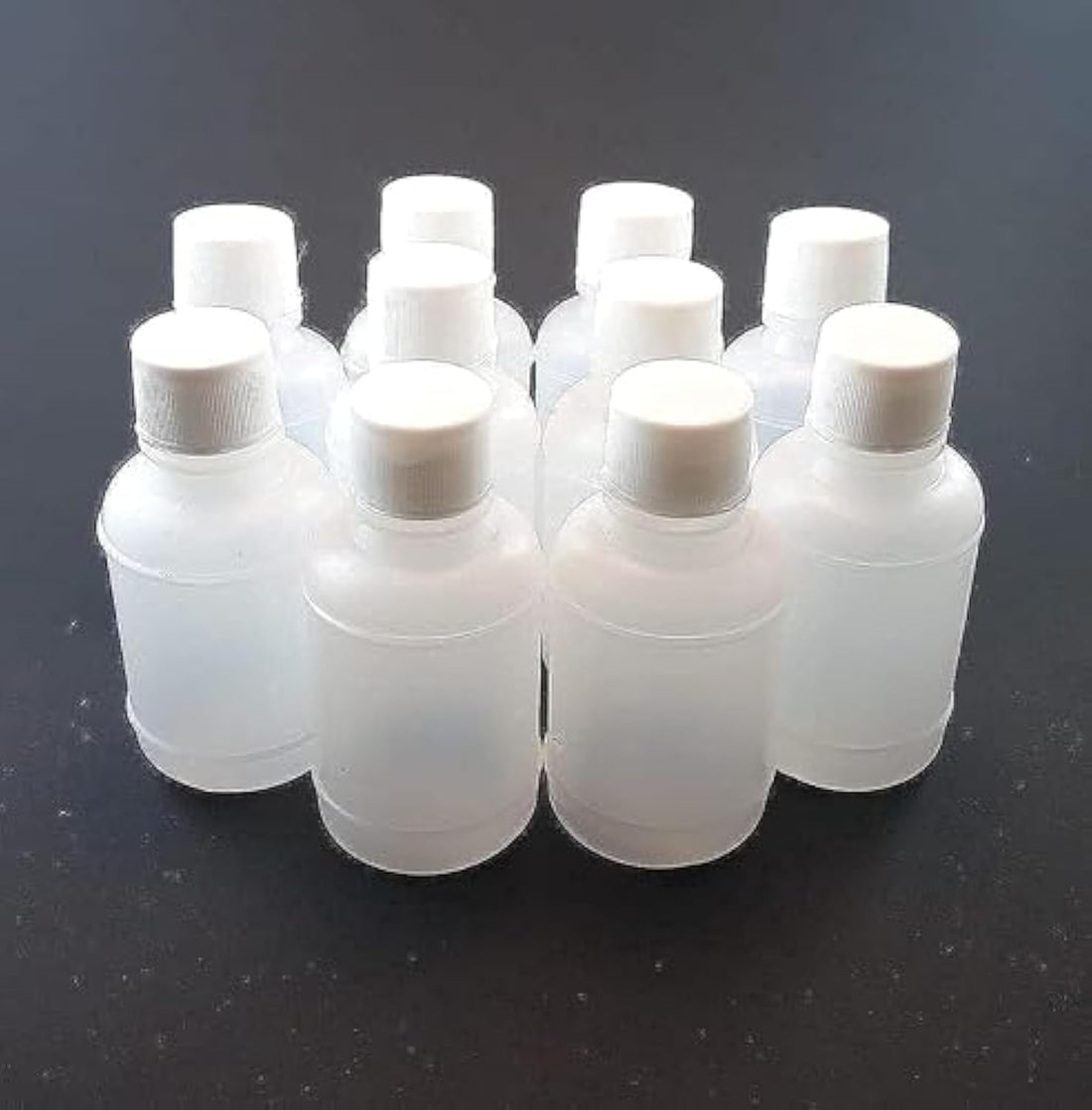 10 bottles of 50 ml empty plastic bottles