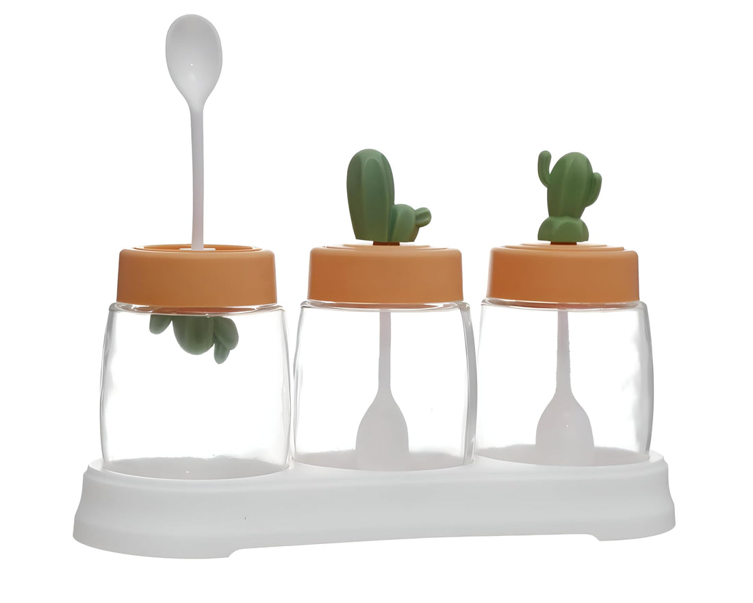 Airtight Bottle Trio - 3-piece glass spice bottles with silicone lids, each bottle includes its own hanging hook, and bright orange transparent lids for easy countertop organization.