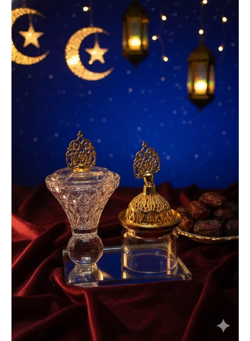 luxurious crystal incense burner, crafted with high quality and elegant gold details. It features a decorative lid and an ornate Arabic incense holder.