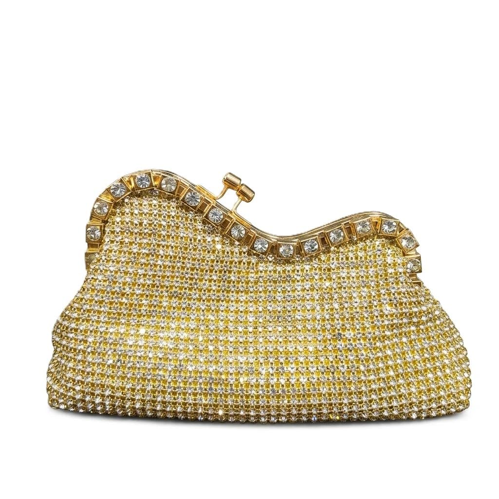 A stunning evening bag featuring a fluid silhouette fully encrusted with shimmering crystals.VS-52