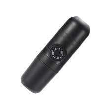 Portable Brewer - Manual espresso maker for camping and hiking trips. Lightweight black device fits car cup holders. Ideal for travelers seeking fresh coffee outdoors without electricity needs.