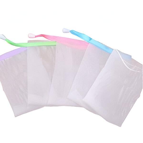 Bath Exfoliator - Enjoy a spa-like experience at home with our dual-function bath exfoliator bag that takes your soap beyond ordinary usage into deeply pampering territory. (1 اكياس صابون)