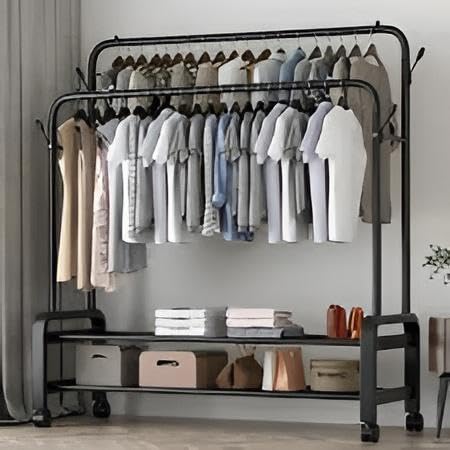 Double Rack - Heavy-duty black metal clothes rail with bottom shelf and swivel casters for durable rolling garment storage solutions in any home or retail shop space today