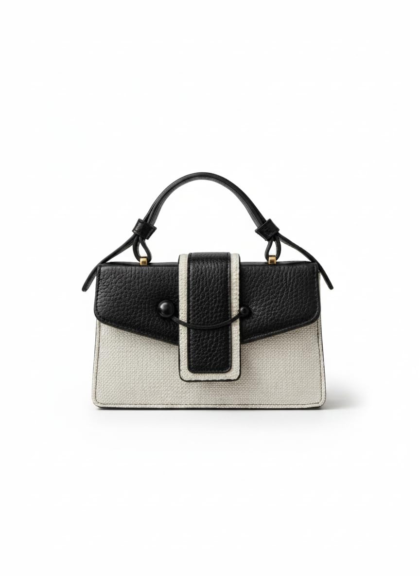 A stylish classic women's handbag, featuring a modern two-tone design in black and beige, with ideal dimensions of 22 x 14 cm, and made of high-quality faux leather.