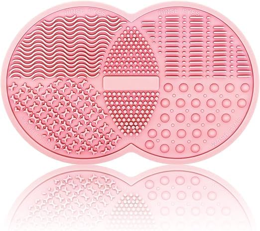 Silicone pad for cleaning makeup brushes with a raised surface and deep