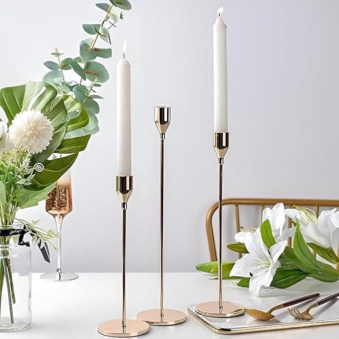 Metal candlestick decor - fine metal craftsmanship, a set of 3 pieces to coordinate luxury home decor, a modern touch to home decor, a set of candle holders (جولد)