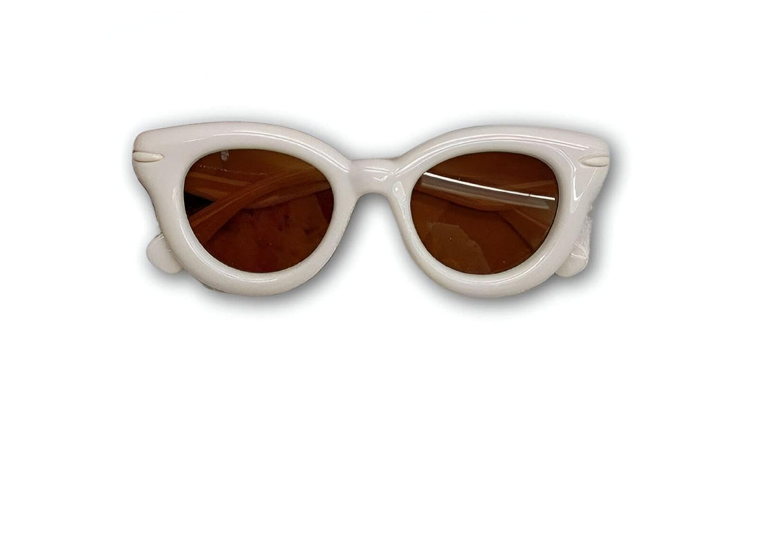 Sunglasses for Kids - Stylish and sturdy, these vibrant sunglasses protect young eyes from harmful UV rays while adding a fun flair to their summer outfits.