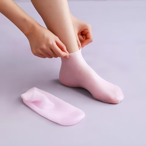Gel Heel Support - Moisturising pink silicone foot socks offering effective relief for cracked heels and foot pain providing comfort for men women