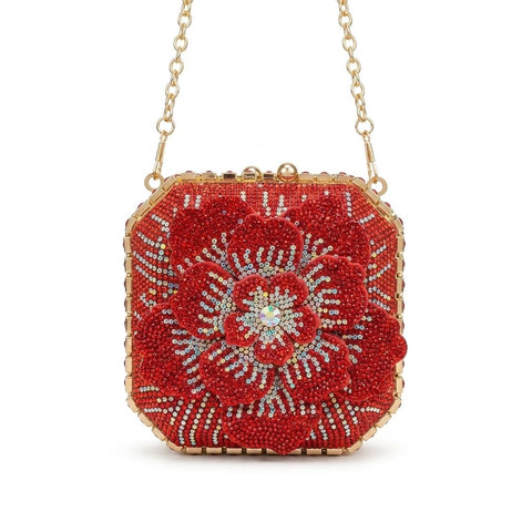 A square evening bag featuring a magnificent, multi-layered sculptural flower as its centerpiece.VS-63