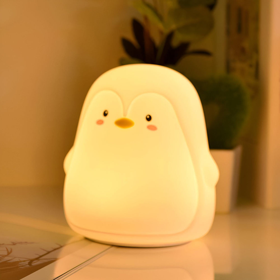 Penguin Lamp - This charming penguin lamp is not only a great decorative piece for nurseries, but also acts as a cozy companion, helping children feel safe while they sleep.