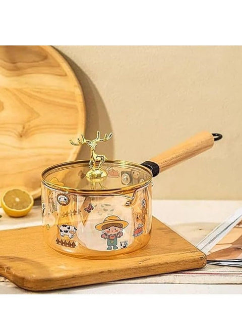 A honey-colored glass pot that can be placed directly on the fire to serve food on the table in an elegant way, with a gazelle cover and a removable wooden handle - 1.8 liter capacity, large size