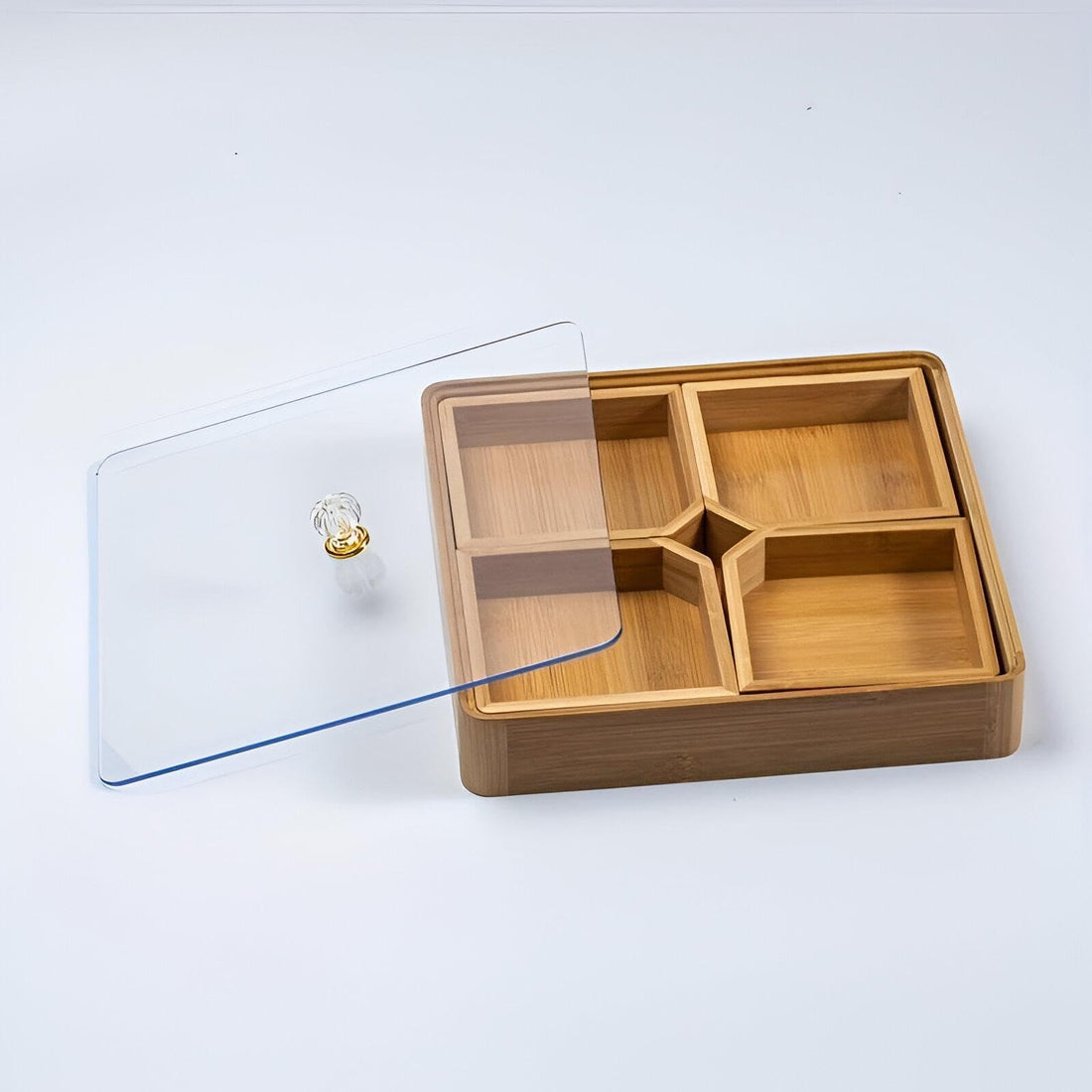 Serving dish-a large box divided into appetizers, candies, nuts, snacks-a transparent acrylic cover that protects food from dust and insects