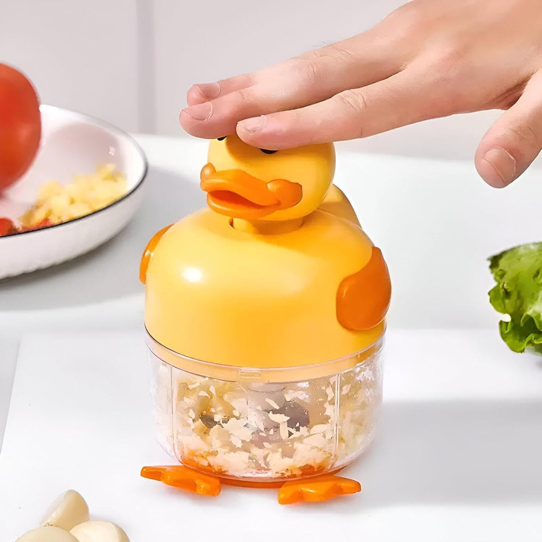 Nut Grinder - Handy kitchen gadget for finely chopping nuts, garlic, and vegetables, featuring a cute duck design and easy-to-separate parts for hassle-free cleaning.