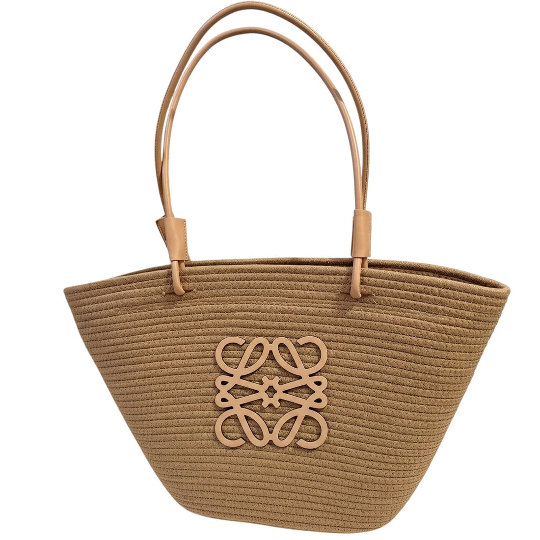 A stylish woven straw beach bag suitable for women and girls with a unique design.