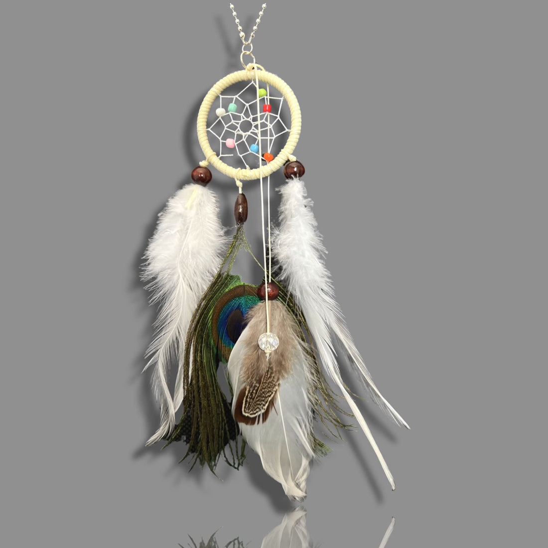 Mirror accessory with dream catcher with peacock feather