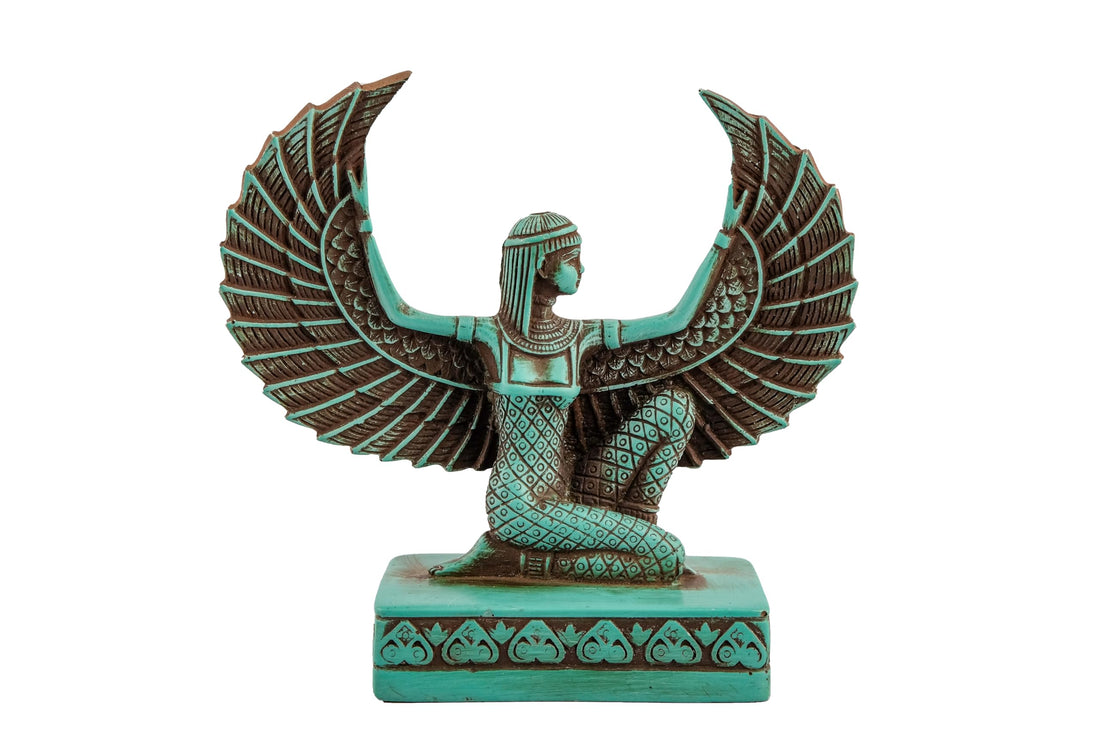 Egyptian statue of Isis handmade from green limestone made in Egypt. Great mother Isis, the goddess of motherhood and magic her name mean Queen of the throne.