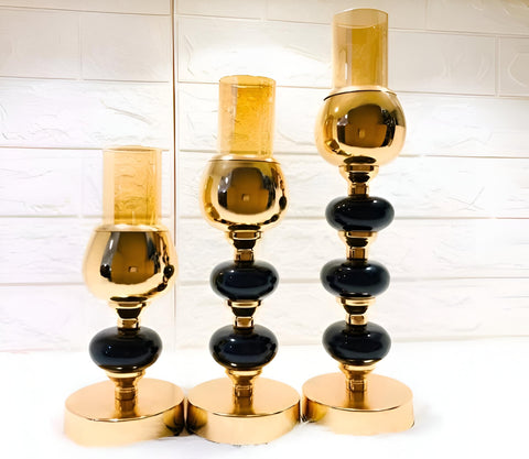 Metal Artwork - Premium candle holder arrangement with detailed patterns and black stone ornaments, designed to elevate any home space or event décor with timeless elegance